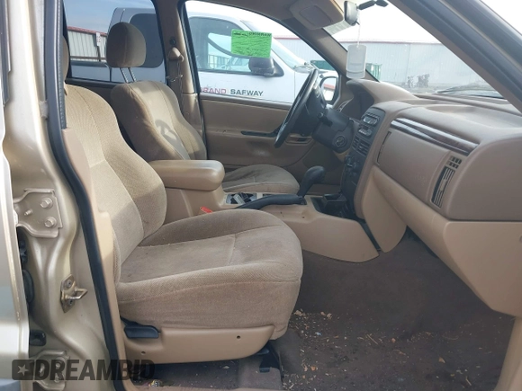 2000 Jeep Grand Cherokee Laredo with VIN 1J4GW48S4YC256978, listed as a IAAI auction lot 40652709 with 117,859 mi miles and . Bid and sale history available at DreamBid. Image 5.