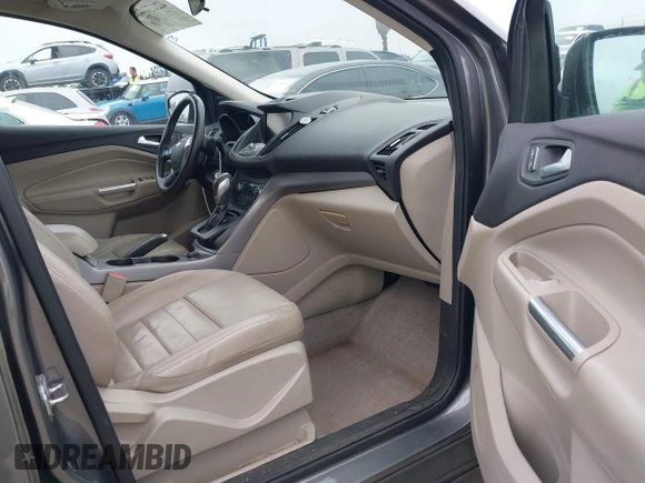 2014 Ford Escape SE with VIN 1FMCU9GX7EUC04296, listed as a IAAI auction lot 42159486 with 108,598 mi miles and . Bid and sale history available at DreamBid. Image 5.