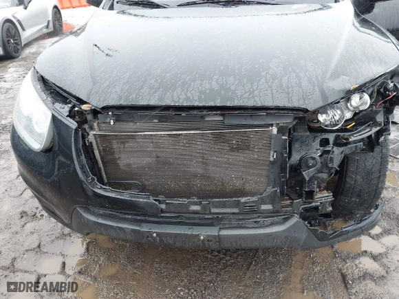 2012 Hyundai Santa Fe GLS with VIN 5XYZG3ABXCG159336, listed as a IAAI auction lot 41635699 with 128,975 mi miles. Bid and sale history available at carsss.com. Image 6.
