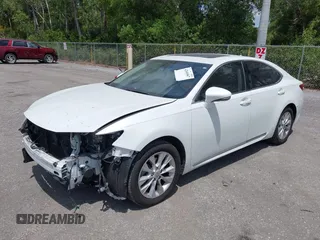 2013 Lexus ES 300h Hybrid with VIN JTHBW1GG0D2002520, listed as a IAAI auction lot 42049567 with 195,538 mi miles. Bid and sale history available at carsss.com. Image 2.