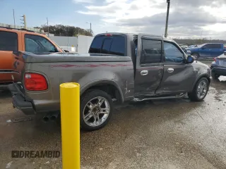 2002 Ford F-150 Harley Davidson with VIN 1FTRW07352KD72978, listed as a Copart auction lot 85037204 with 53,951 mi miles and Salvage Title. Bid and sale history available at carsss.com. Image 3.