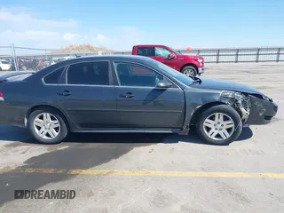 2013 Chevrolet Impala LT with VIN 2G1WB5E31D1163179, listed as a IAAI auction lot 41908130 with 190,801 mi miles and . Bid and sale history available at DreamBid. Image 13.
