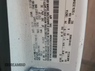 2014 Ford Escape SE z VIN 1FMCU9GX5EUC60849, wystawiony jako Copart lot #60498575 z przebiegiem Nie podano mil oraz Szkoda całkowita • Salvage title. Historia ofert i sprzedaży dostępna na DreamBid. Obrazek 13.