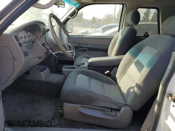 2003 Ford Explorer Sport XLS z VIN 1FMYU60E03UB97766, wystawiony jako Copart lot #82920774 z przebiegiem 131 273 mil mil oraz Tytuł czysty. Historia ofert i sprzedaży dostępna na DreamBid. Obrazek 7.
