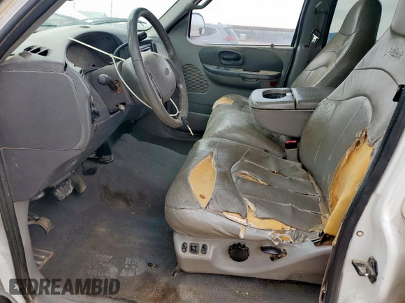 2001 Ford F-150 XLT z VIN 1FTRW08L31KF27329, wystawiony jako Copart lot #61018835 z przebiegiem Nie podano mil oraz Czysty tytuł • Clean title. Historia ofert i sprzedaży dostępna na DreamBid. Obrazek 7.