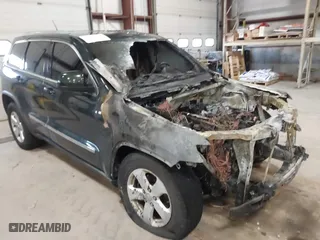 2011 Jeep Grand Cherokee Laredo with VIN 1J4RR4GTXBC545672, listed as a IAAI auction lot 41459138 with 1 mi miles. Bid and sale history available at carsss.com. Image 1.