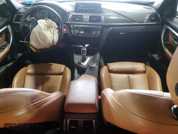 2016 BMW 3 Series 328i xDrive with VIN WBA8E3C59GK502613, listed as a Copart auction lot 63661805 with 127,559 mi miles and Salvage title. Bid and sale history available at DreamBid. Image 8.