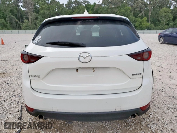 2020 Mazda CX-5 Touring z VIN JM3KFACM6L0787687, wystawiony jako Copart lot #57639555 z przebiegiem 91 219 mil mil oraz Szkoda całkowita • Salvage title. Historia ofert i sprzedaży dostępna na DreamBid. Obrazek 6.