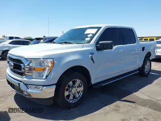2021 Ford F-150 XL with VIN 1FTEW1CP4MKD82871, listed as a IAAI auction lot 42301025 with 54,757 mi miles and . Bid and sale history available at DreamBid. Image 2.