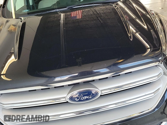 2019 Ford Escape Titanium with VIN 1FMCU9J96KUA01051, listed as a IAAI auction lot 42841649 with 69,720 mi miles and . Bid and sale history available at DreamBid. Image 3.