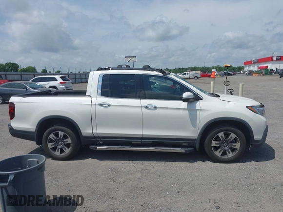 2019 Honda Ridgeline RTL-E with VIN 5FPYK3F77KB021667, listed as a IAAI auction lot 42115019 with 87,221 mi miles and . Bid and sale history available at DreamBid. Image 13.