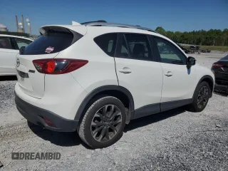 2016 Mazda CX-5 Grand Touring with VIN JM3KE4DY0G0819528, listed as a Copart auction lot 52343885 with 77,340 mi miles and Clean Title. Bid and sale history available at DreamBid. Image 3.