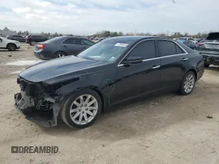 2015 Cadillac CTS RWD with VIN 1G6AP5SX2F0124550, listed as a Copart auction lot 47004245 with 124,466 mi miles and Salvage title. Bid and sale history available at DreamBid. Image 1.