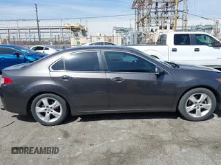2010 Acura TSX with VIN JH4CU2F67AC038297, listed as a IAAI auction lot 41844587 with 136,741 mi miles and . Bid and sale history available at DreamBid. Image 13.