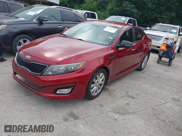 2014 Kia Optima EX z VIN 5XXGN4A71EG284280, wystawiony jako IAAI lot #42278795 z przebiegiem 179 200 mil mil oraz . Historia ofert i sprzedaży dostępna na DreamBid. Obrazek 2.