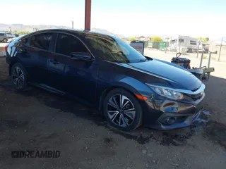 2018 Honda Civic EX-L z VIN JHMFC1F8XJX033602, wystawiony jako IAAI lot #42161015 z przebiegiem 99 597 mil mil oraz . Historia ofert i sprzedaży dostępna na DreamBid. Obrazek 1.
