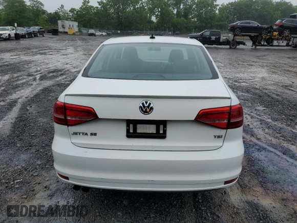 2015 Volkswagen Jetta SE with VIN 3VWD17AJ9FM233571, listed as a Copart auction lot 61436735 with 58,690 mi miles and Salvage title. Bid and sale history available at DreamBid. Image 6.
