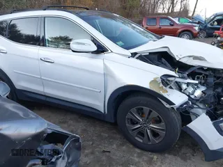 2014 Hyundai Santa Fe with VIN 5XYZUDLB4EG129473, listed as a IAAI auction lot 40978108 with 169,997 mi miles and . Bid and sale history available at DreamBid. Image 6.