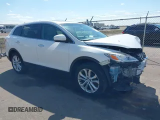 2011 Mazda CX-9 Grand Touring with VIN JM3TB3DA0B0311353, listed as a IAAI auction lot 42085234 with 156,578 mi miles and . Bid and sale history available at DreamBid. Image 1.