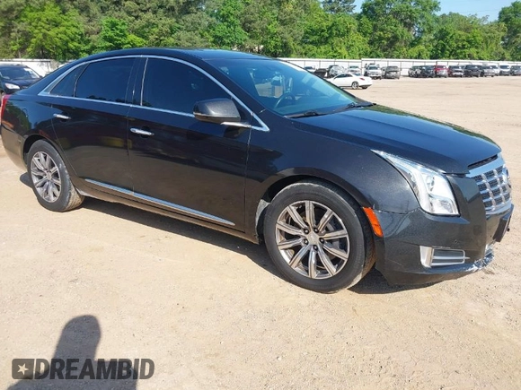 2013 Cadillac XTS Premium z VIN 2G61S5S34D9127996, wystawiony jako IAAI lot #41978539 z przebiegiem 185 157 mil mil oraz . Historia ofert i sprzedaży dostępna na DreamBid. Obrazek 1.
