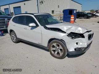 2014 BMW X1 sDrive28i with VIN WBAVM1C53EVW52268, listed as a Copart auction lot 51279755 with 193,173 mi miles and Salvage Title. Bid and sale history available at carsss.com. Image 4.