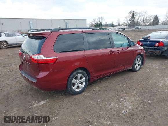 2016 Toyota Sienna LE AAS with VIN 5TDKK3DC0GS751907, listed as a IAAI auction lot 41831340 with 100,610 mi miles. Bid and sale history available at carsss.com. Image 4.