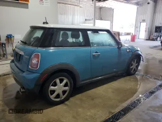 2009 MINI Hardtop with VIN WMWMF33569TW74610, listed as a Copart auction lot 54889805 with 147,533 mi miles and Salvage Title. Bid and sale history available at DreamBid. Image 3.