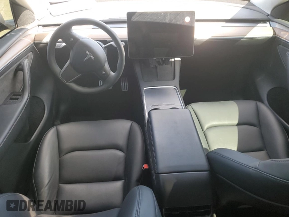 2023 Tesla Model Y Performance with VIN 7SAYGDEF3PF946496, listed as a Copart auction lot 50800315 with 15,077 mi miles and Salvage Title. Bid and sale history available at DreamBid. Image 8.