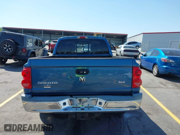 2005 Dodge Dakota SLT with VIN 1D7HW48N05S319621, listed as a IAAI auction lot 42037140 with 251,595 mi miles and . Bid and sale history available at DreamBid. Image 16.