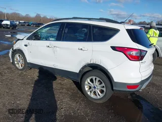 2017 Ford Escape SE with VIN 1FMCU9GD5HUE00425, listed as a IAAI auction lot 41843115 with 64,896 mi miles. Bid and sale history available at carsss.com. Image 3.