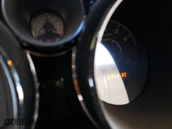 2008 Saturn Sky z VIN 1G8MB35B58Y125607, wystawiony jako Copart lot #79704064 z przebiegiem 62 914 mil mil oraz Szkoda całkowita • Salvage title. Historia ofert i sprzedaży dostępna na DreamBid. Obrazek 9.