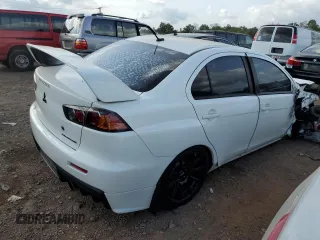 2011 Mitsubishi Lancer Evolution GSR with VIN JA32W8FV4BU033621, listed as a Copart auction lot 71182174 with 129,131 mi miles and Salvage Title. Bid and sale history available at carsss.com. Image 3.