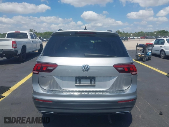 2021 Volkswagen Tiguan S with VIN 3VV1B7AX7MM117954, listed as a IAAI auction lot 42300223 with 45,587 mi miles and . Bid and sale history available at DreamBid. Image 16.