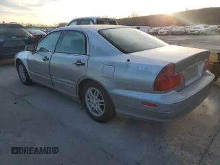 2000 Mitsubishi Diamante LS z VIN 6MMAP67P5YT006608, wystawiony jako Copart lot #49009455 z przebiegiem 241 503 mil mil oraz Tytuł czysty. Historia ofert i sprzedaży dostępna na DreamBid. Obrazek 2.