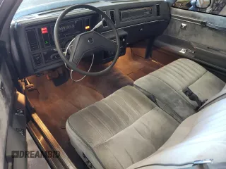 1987 Buick Regal with VIN 1G4GJ11Y4HP413978, listed as a Copart auction lot 72449154 with 52,519 mi miles and Salvage Title. Bid and sale history available at DreamBid. Image 8.