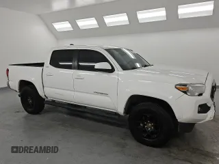 2020 Toyota Tacoma SR5 with VIN 3TMAZ5CN6LM114925, listed as a Copart auction lot 61650325 with 64,725 mi miles and Clean title. Bid and sale history available at DreamBid. Image 4.
