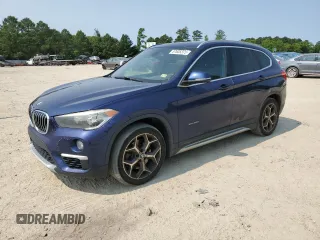 2018 BMW X1 xDrive28i with VIN WBXHT3C36J5L25454, listed as a Copart auction lot 57635375 with 108,425 mi miles and Salvage title. Bid and sale history available at DreamBid. Image 1.