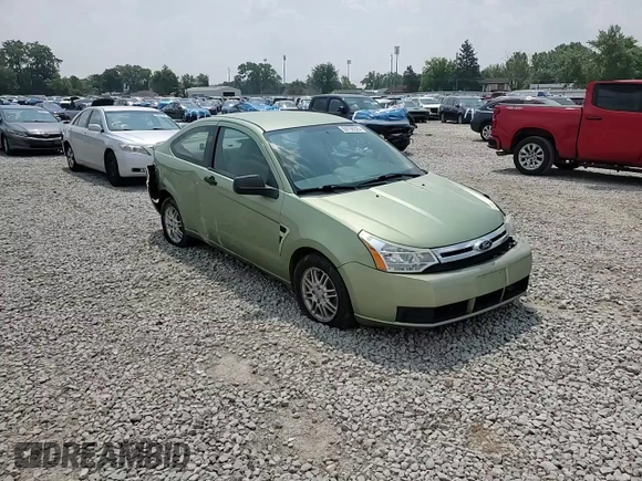 2008 Ford Focus SE z VIN 1FAHP33NX8W141079, wystawiony jako Copart lot #59759325 z przebiegiem 71 522 mil mil oraz Szkoda całkowita • Salvage title. Historia ofert i sprzedaży dostępna na DreamBid. Obrazek 13.