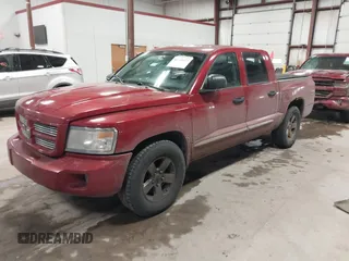 2008 Dodge Dakota Laramie z VIN 1D7HW58N98S634217, wystawiony jako IAAI lot #41739357 z przebiegiem 263 329 mil mil oraz . Historia ofert i sprzedaży dostępna na DreamBid. Obrazek 2.