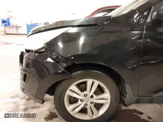 2013 Hyundai Tucson GLS with VIN KM8JU3AC0DU754948, listed as a IAAI auction lot 41811891 with 139,056 mi miles. Bid and sale history available at carsss.com. Image 20.