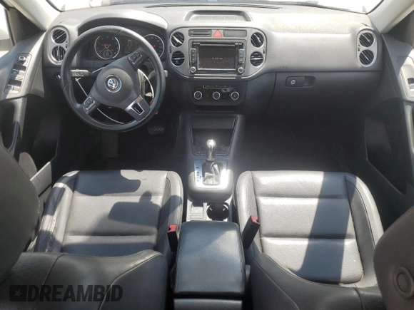 2011 Volkswagen Tiguan SEL w/Premium Navi z VIN WVGAV7AX1BW540155, wystawiony jako Copart lot #56483975 z przebiegiem 137 970 mil mil oraz Czysty tytuł • Clean title. Historia ofert i sprzedaży dostępna na DreamBid. Obrazek 8.