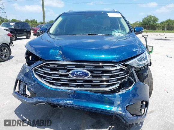 2020 Ford Edge SEL z VIN 2FMPK3J94LBB45306, wystawiony jako IAAI lot #39398218 z przebiegiem 59 807 mil mil oraz . Historia ofert i sprzedaży dostępna na DreamBid. Obrazek 13.