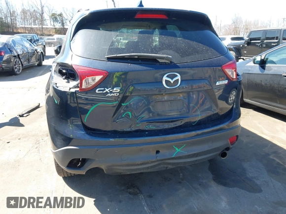 2016 Mazda CX-5 Touring with VIN JM3KE4CY0G0631786, listed as a IAAI auction lot 41761214 with 220,058 mi miles. Bid and sale history available at carsss.com. Image 17.