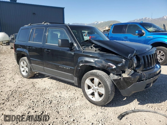 2014 Jeep Patriot Latitude with VIN 1C4NJRFB5ED855888, listed as a Copart auction lot 57969355 with 113,196 mi miles and Salvage title. Bid and sale history available at DreamBid. Image 4.