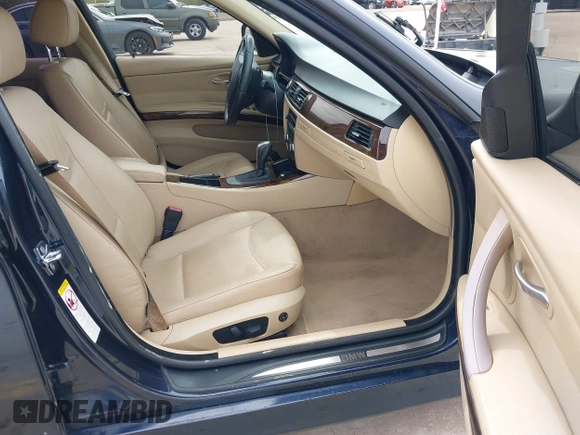 2009 BMW 3 Series 328i with VIN WBAPH77579NM31725, listed as a IAAI auction lot 41901344 with 143,905 mi miles. Bid and sale history available at carsss.com. Image 5.