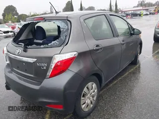 2013 Toyota Yaris L with VIN JTDKTUD39DD552185, listed as a IAAI auction lot 41577259 with 159,662 mi miles. Bid and sale history available at carsss.com. Image 4.