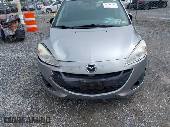 2012 Mazda 5 Touring with VIN JM1CW2CLXC0100740, listed as a IAAI auction lot 41918794 with 234,102 mi miles and . Bid and sale history available at DreamBid. Image 6.