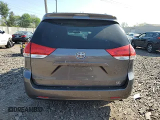 2014 Toyota Sienna LE with VIN 5TDJK3DC0ES080201, listed as a Copart auction lot 55147745 with 133,216 mi miles and Salvage Title. Bid and sale history available at DreamBid. Image 6.