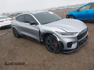 2021 Ford Mustang Mach-E GT z VIN 3FMTK4SE1MME00154, wystawiony jako IAAI lot #41536548 z przebiegiem 19 568 mil mil oraz . Historia ofert i sprzedaży dostępna na DreamBid. Obrazek 1.