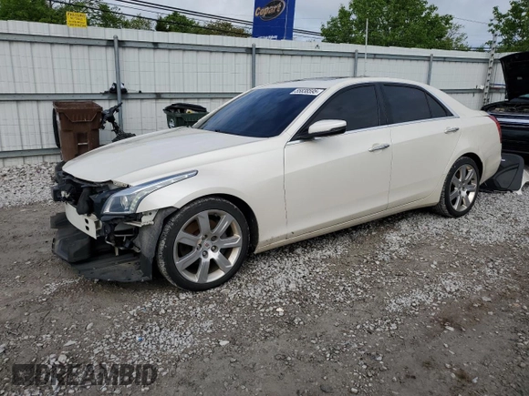 2014 Cadillac CTS Premium AWD with VIN 1G6AZ5S35E0156897, listed as a Copart auction lot 55838595 with 124,999 mi miles and Salvage title. Bid and sale history available at DreamBid. Image 1.